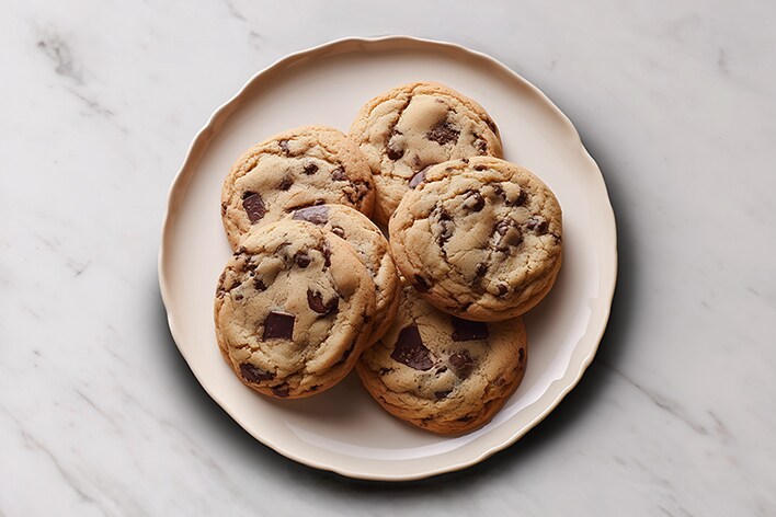 Plate of freshly baked chocolate chip cookies.