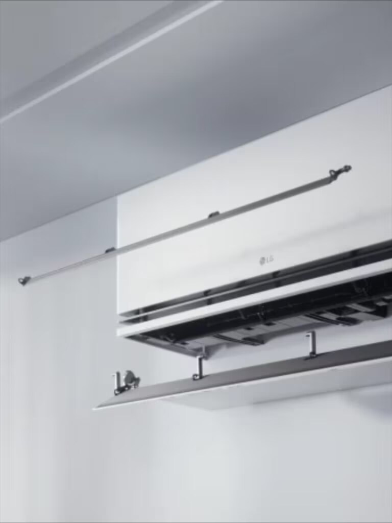 LG air conditioner with dual vane technology directing airflow for enhanced cooling and heating efficiency.