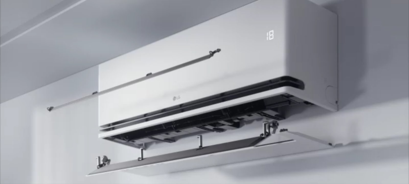 LG air conditioner with dual vane technology directing airflow for enhanced cooling and heating efficiency.