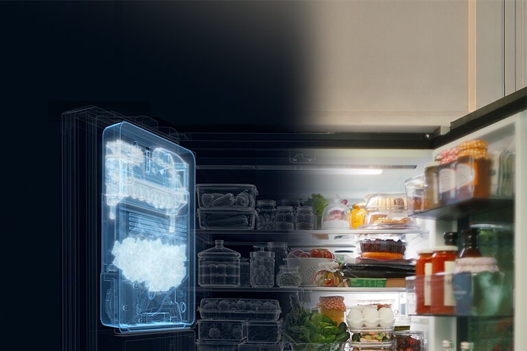 An open refrigerator with the Slim SpacePlus™ Ice System making ice.
