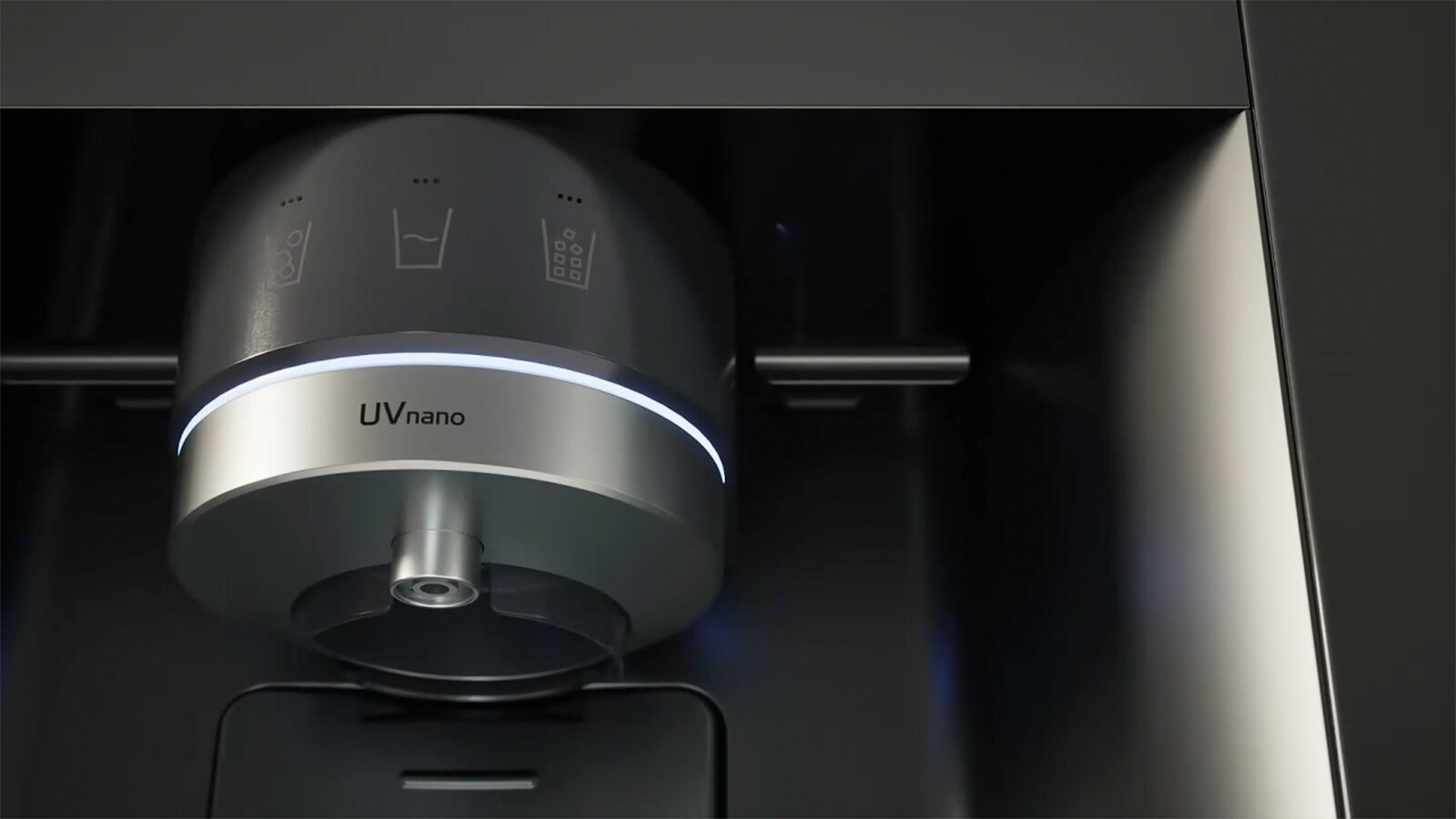 Water being dispensed from a dispenser nozzle with the UVnano feature into a cup filled with ice.