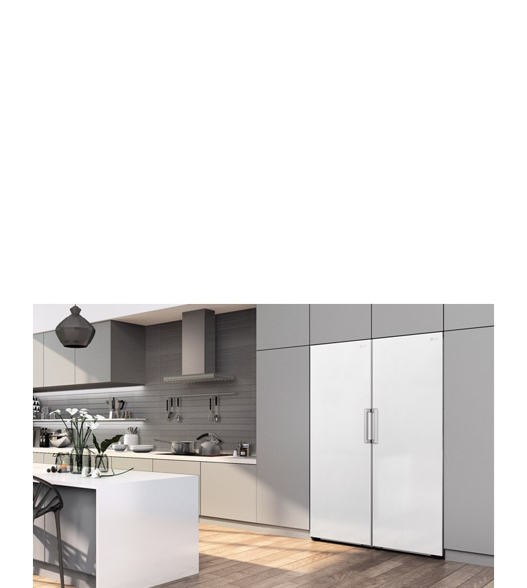 The freezer is shown at an angle seamlessly fitting in with the cabinets in a modern kitchen.