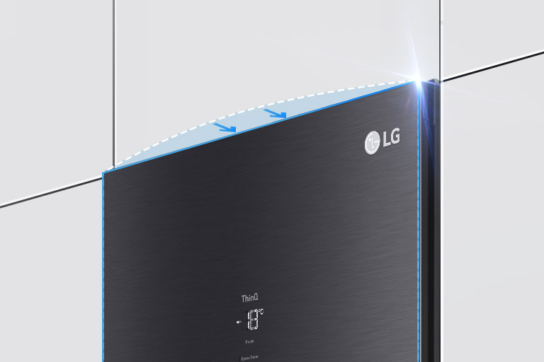 The top of the freezer is shown at an angle with two arrows pointing in toward the wall to indicate it is flush with the cabinets surrounding it.