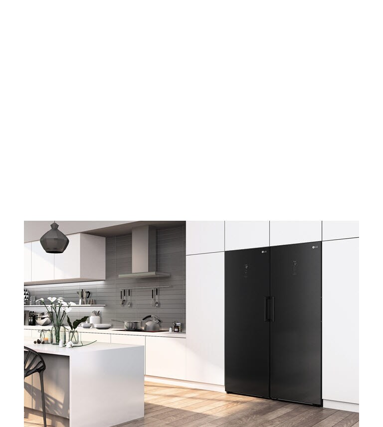 The refrigerator is seen seamlessly fitting into a kitchen.