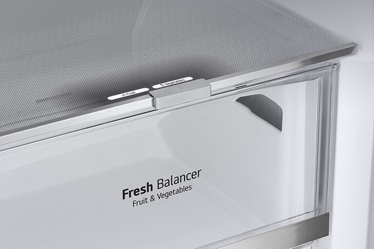 The metallic decorations inside the fridge on the drawers are highlighted and labeled "Metallic Decoration" on the photo.