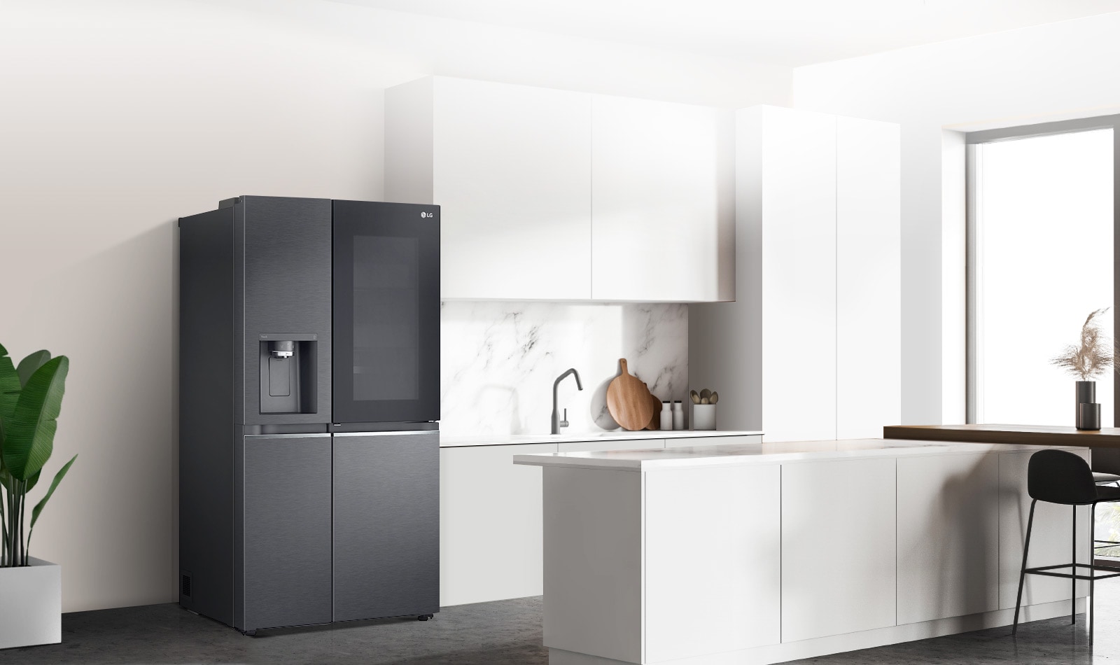 A side view of a kitchen with a black InstaView refrigerator installed.