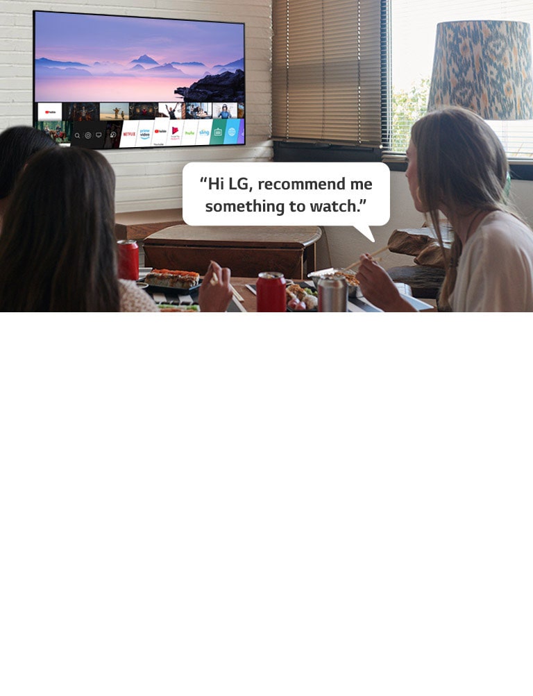 Three woman eating sushi while one of them asks LG TV recommendations to watch