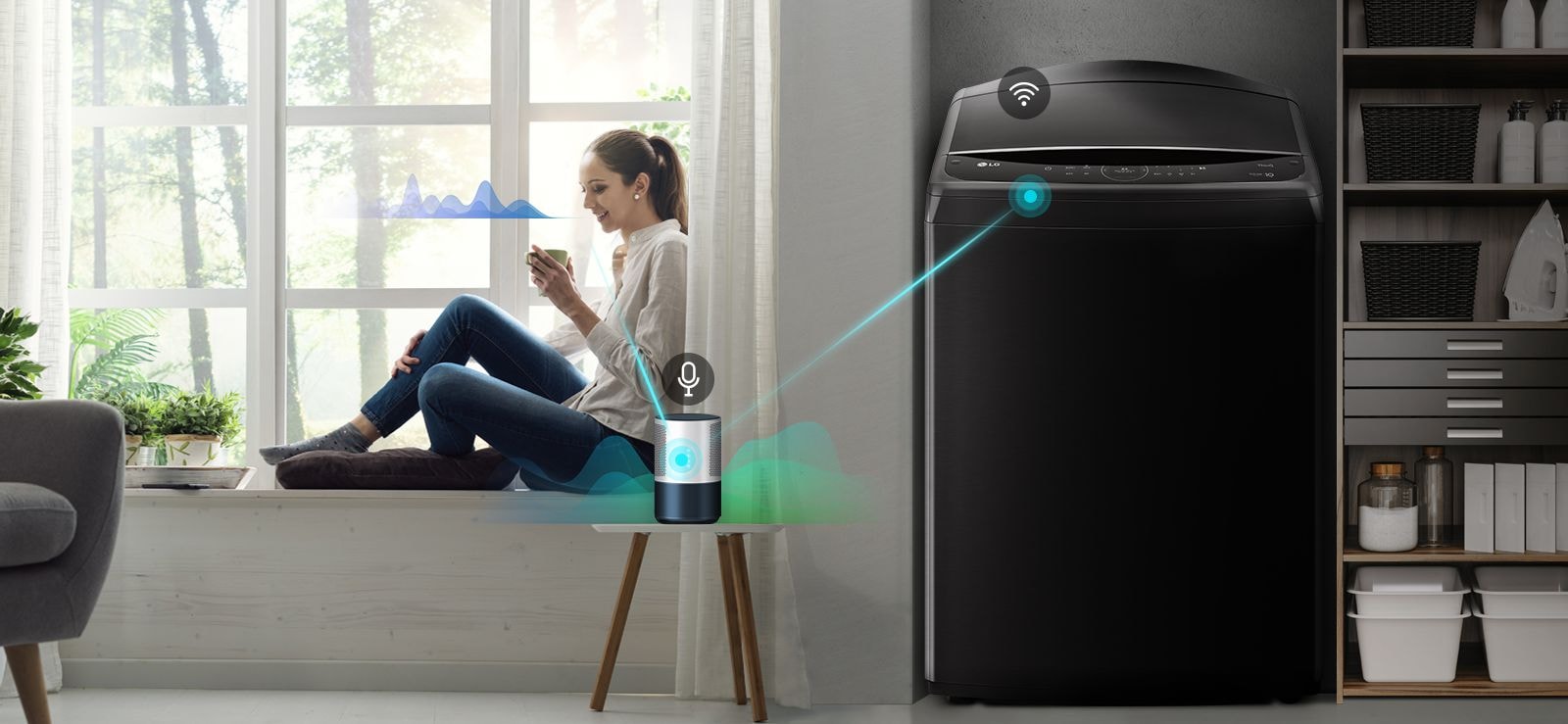 The woman is sitting by the window telling the ai speaker what the washing machine needs.