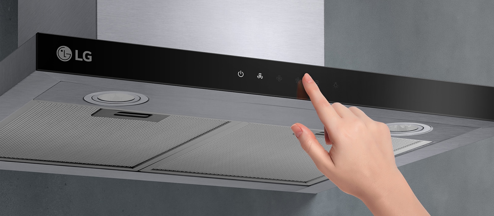 This is an image of touching the touch control of the hood with a finger.