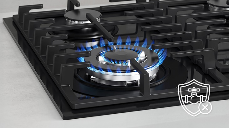 Black gas cooktop with blue flame and flame-failure safety that automatically shuts off gas.
