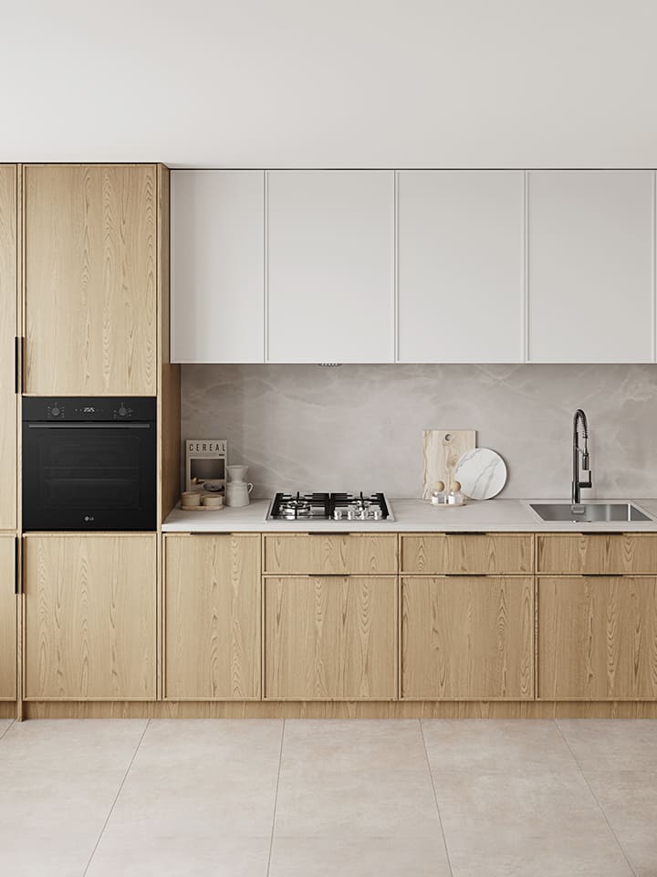 Modern kitchen with built-in black gas cooktop, integrated oven, and stainless steel sink.