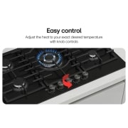 LG 90cm Built-In Gas Cooktop with Cast Iron Wok Grids and Black Tempered Glass, Close-up of black gas cooktop with blue flame and rotary knobs., CG7D3626G, thumbnail 4