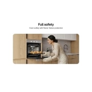 LG 60cm Built-In Gas Oven, 52L Capacity with Air Fry Function, Woman placing a tray of baked pastries into a built-in oven., WSG3D6011S, thumbnail 7