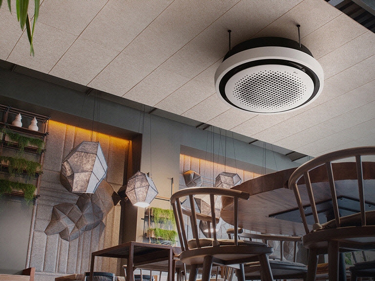 A café unfolds, adorned with chairs, tables, and plants, while an LG round cassette is displayed at the ceiling.