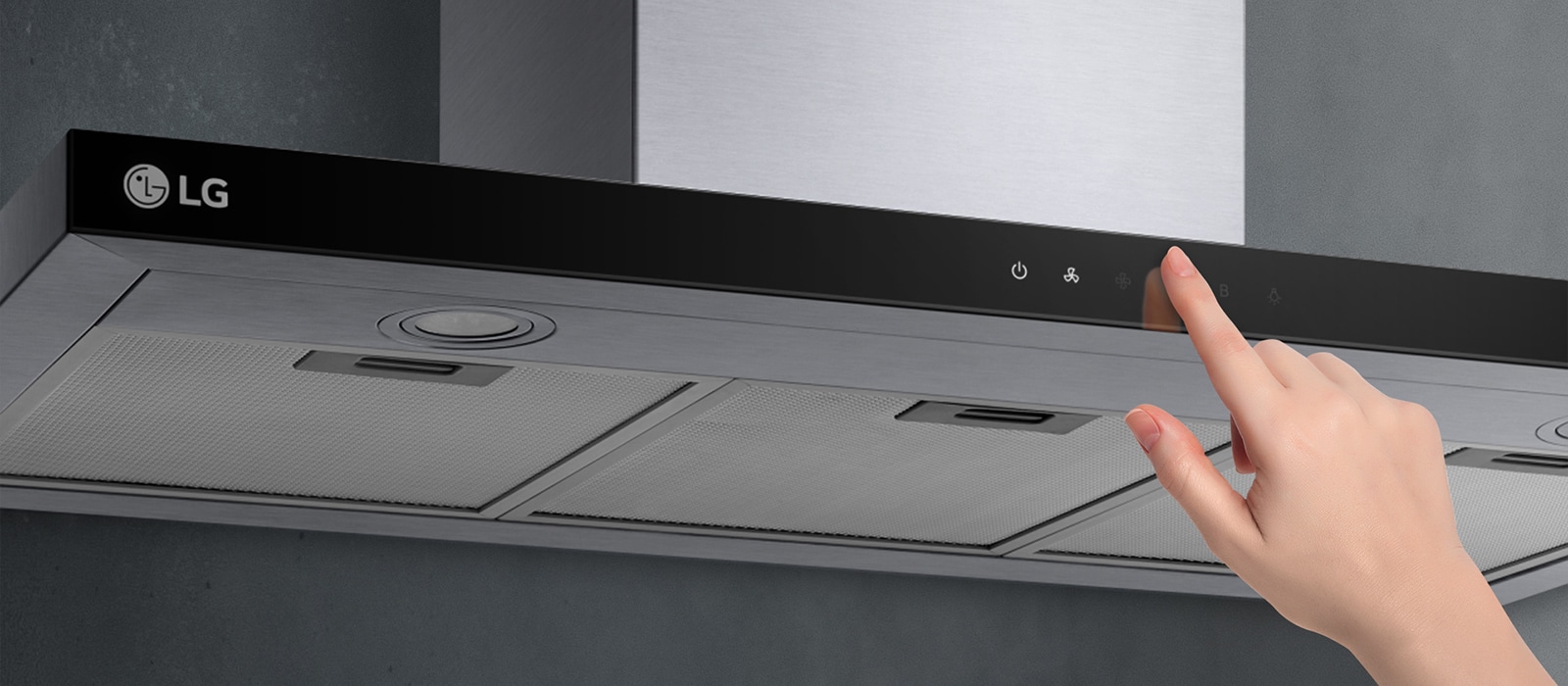 This is an image of touching the touch control of the hood with a finger.