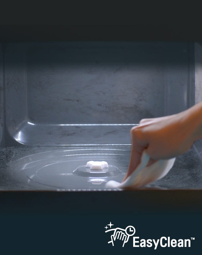 It shows a hand wiping the inner side of LG Neochef™