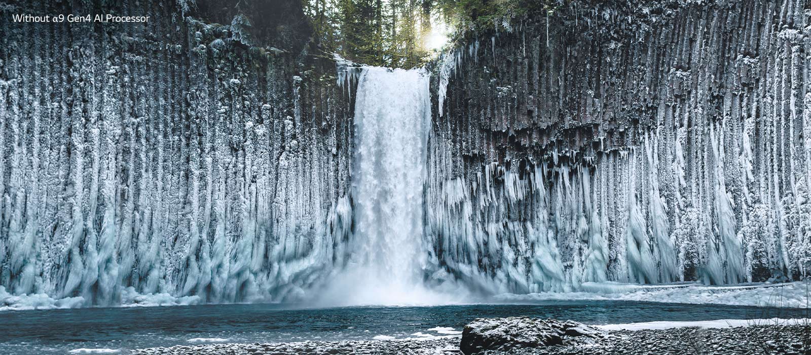 Slider comparison of picture quality of a frozen waterfall in a forest.