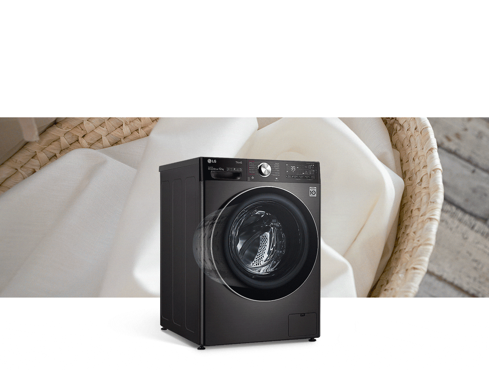 A washing machine, expressed as a large capacity, is in front of the laundry basket image.