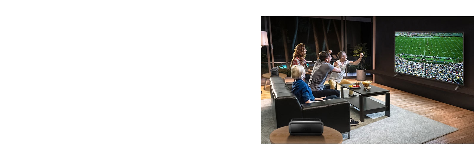 People watching sports game on TV in the living room with Bluetooth rear speakers.