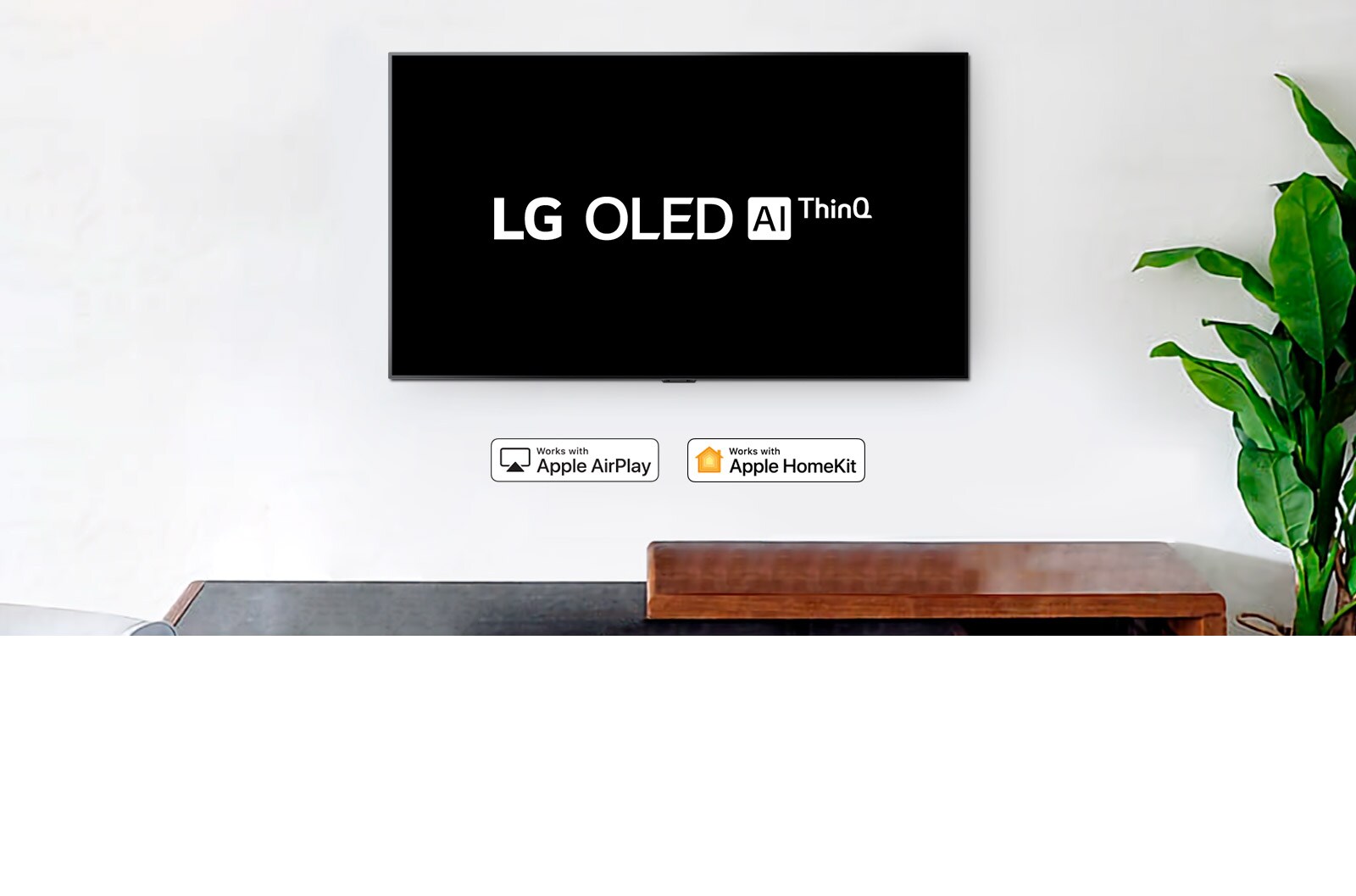 Wall-mounted TV showing LG OLED AI ThinQ logo on black background