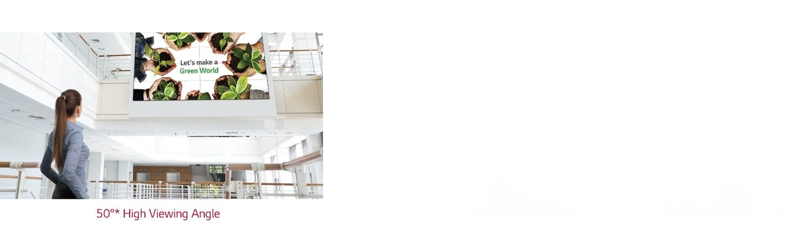 A woman is looking up at the screen installed upstairs.