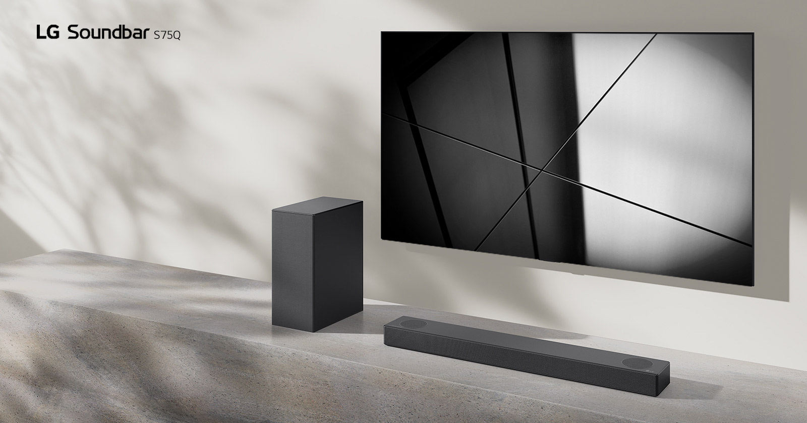LG sound bar S75Q and LG TV are placed together in the living room. The TV is on, displaying a black and white image.