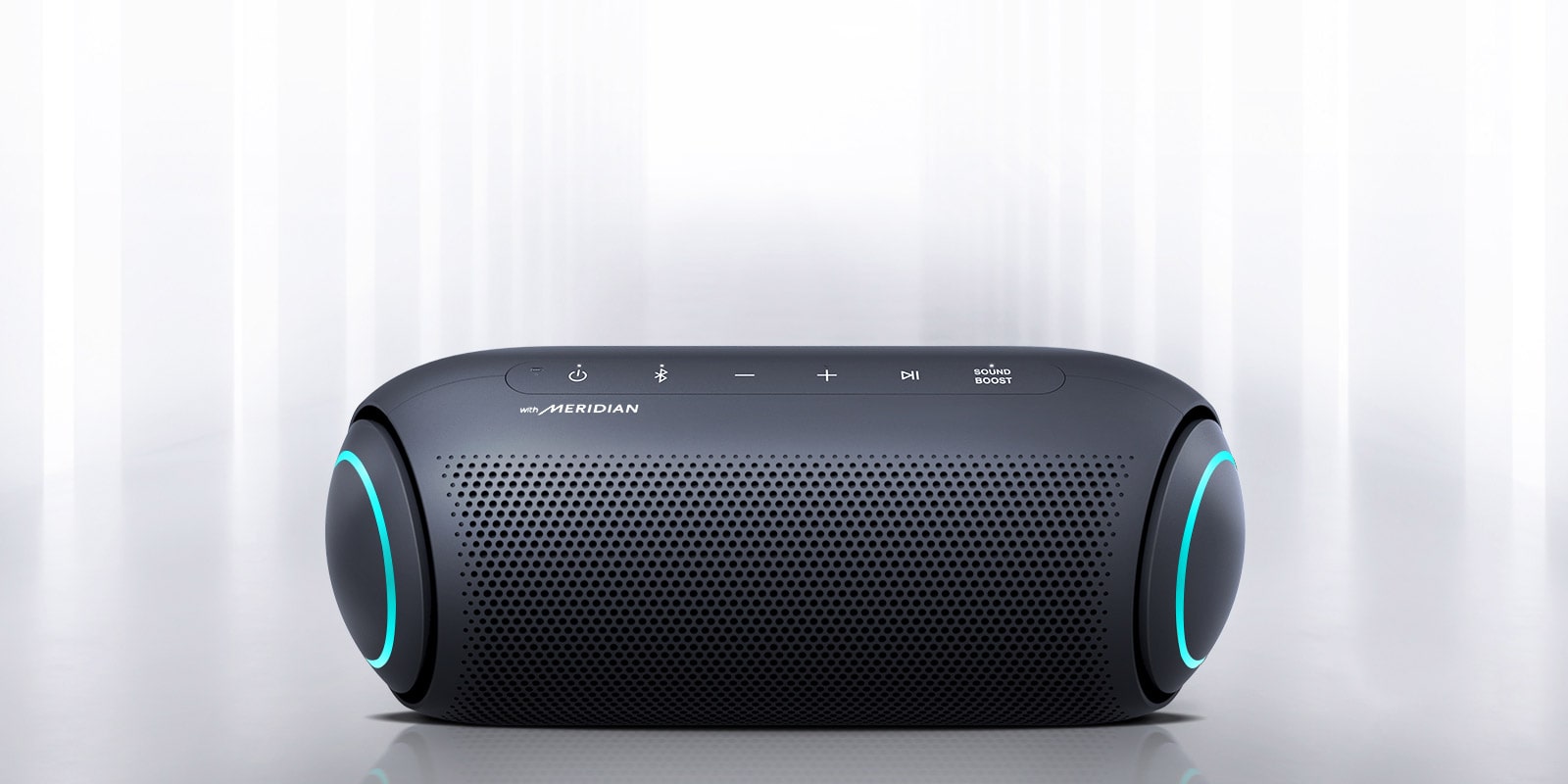 Light shines from the surroundings and the front of the XBOOM Go with blue lighting on either end is visible.