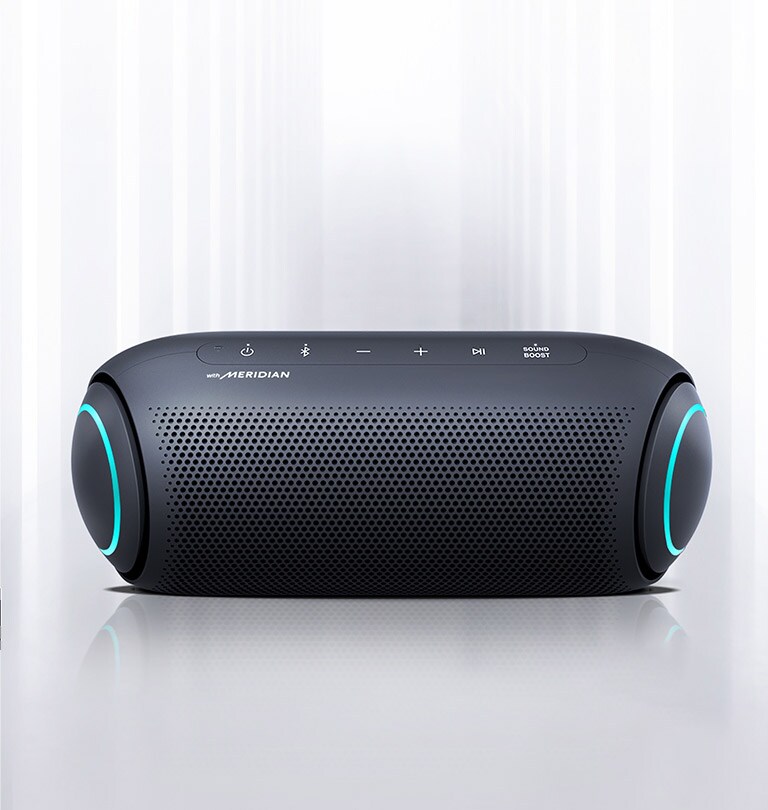 Light shines from the surroundings and the front of the XBOOM Go with blue lighting on either end is visible.