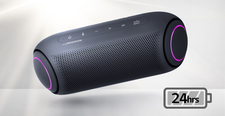 LG XBOOM Go tilts to the left and floats in the air. The woofer lighting is magenta. 