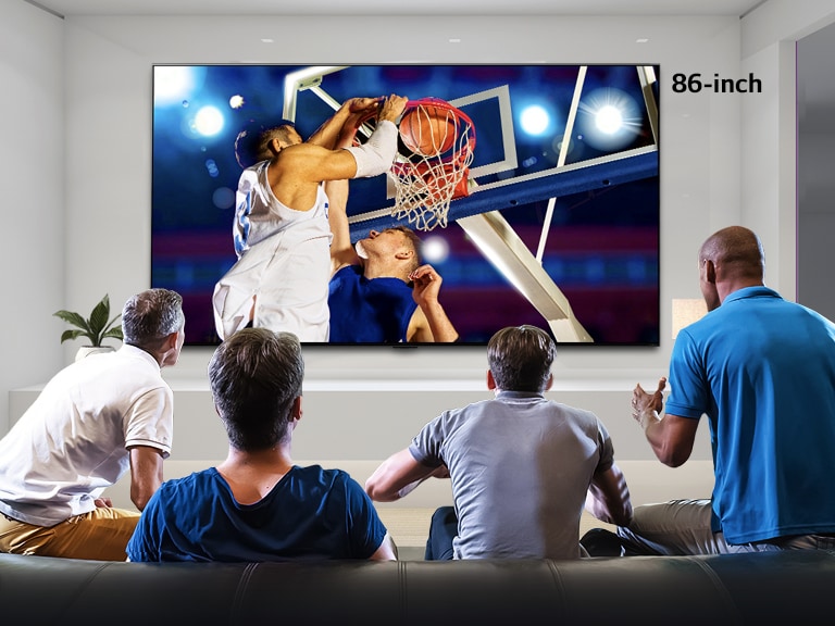 Rear view of a wall mounted TV showing a basketball game with four men watching. Scrolling left-right shows the difference in size between a 43-inch and 86-inch screen.