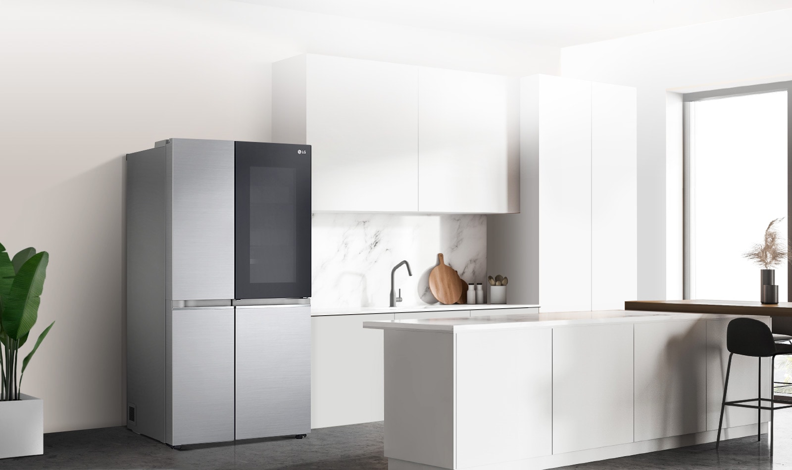 A side view of a kitchen with a black InstaView refrigerator installed.