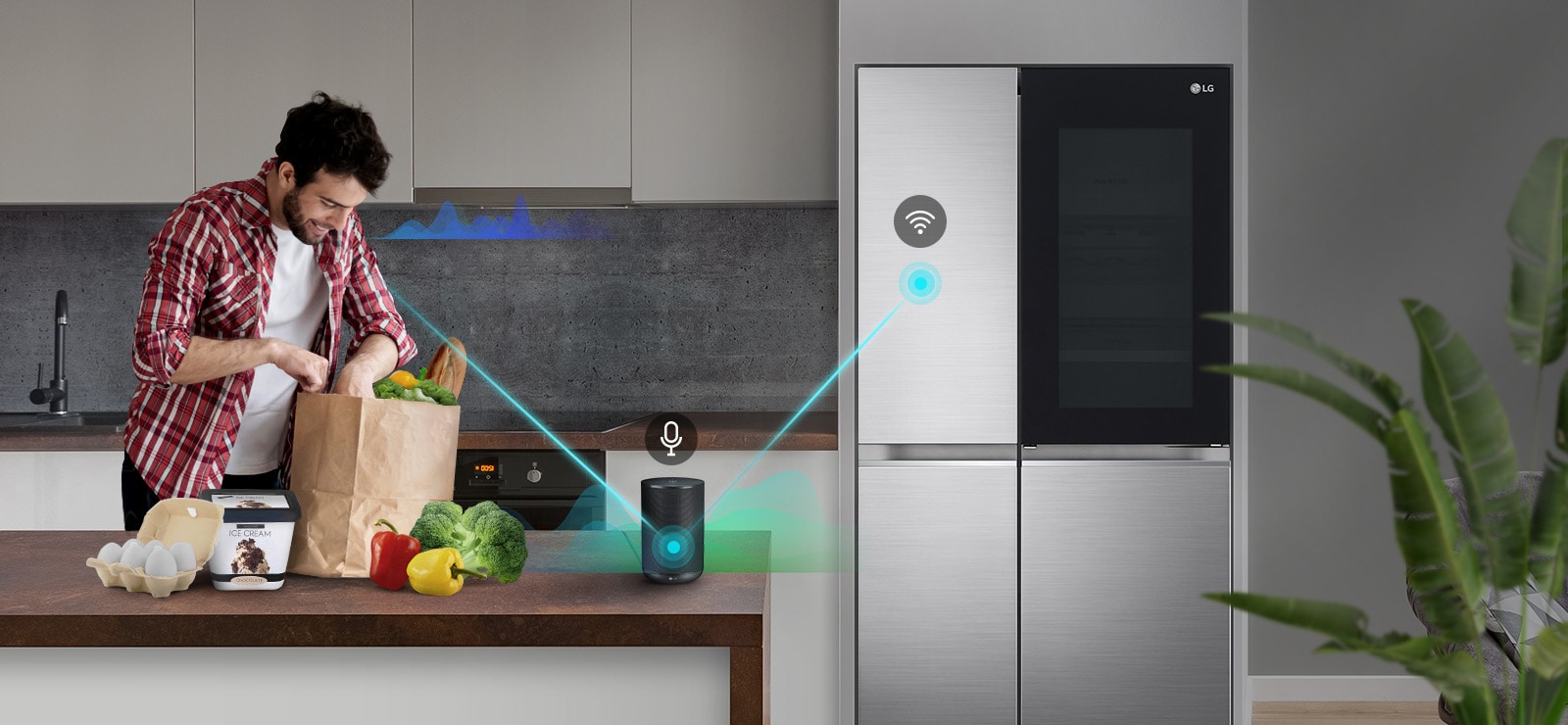 A man stands in a kitchen unloading produce from a grocery bag and speaks, shown by volume bars moving up and down near him, to the AI speaker on the counter telling it to "turn on express freeze". A line appears that goes from the man to the AI speaker which has a microphone icon above it. Then volume bars show up near the AI speaker and a line appears from the AI speaker to the refrigerator which has a Wifi icon above it.