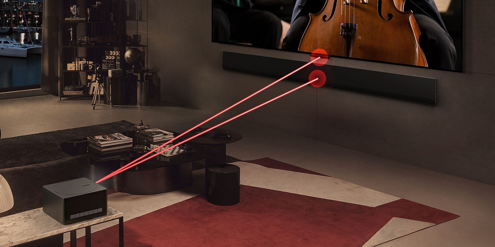LG OLED evo M4 ekrane groja koncertas, o priešais stovi „Zero Connect Box“. Virš „Zero Connect Box“ pasirodo raudonas „Wi-Fi“ signalas, o du raudonos šviesos spinduliai sklinda į televizorių ir LG Soundbar.