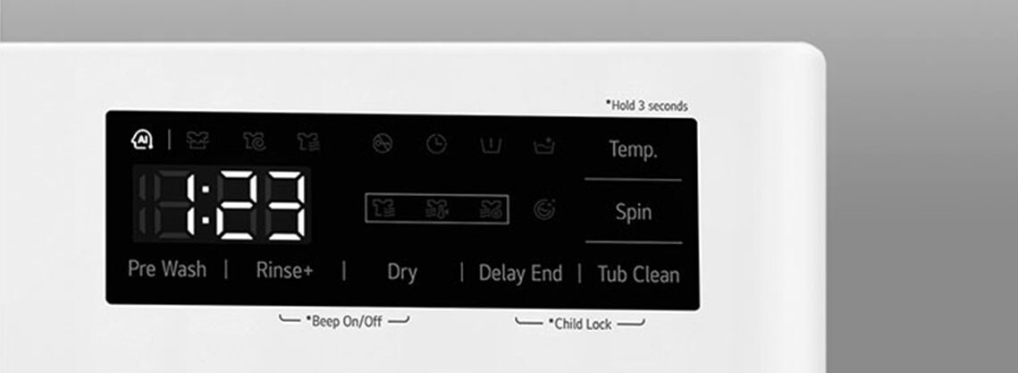 Išdidintas skalbyklės skydelio metalinės rankenėlės vaizdas.