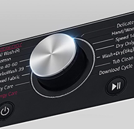 Išdidintas skalbyklės skydelio metalinės rankenėlės vaizdas.