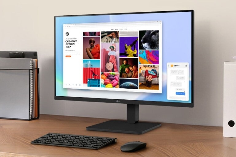 Darbo vieta ant stalo su monitoriumi ir dokumentų laikikliu.