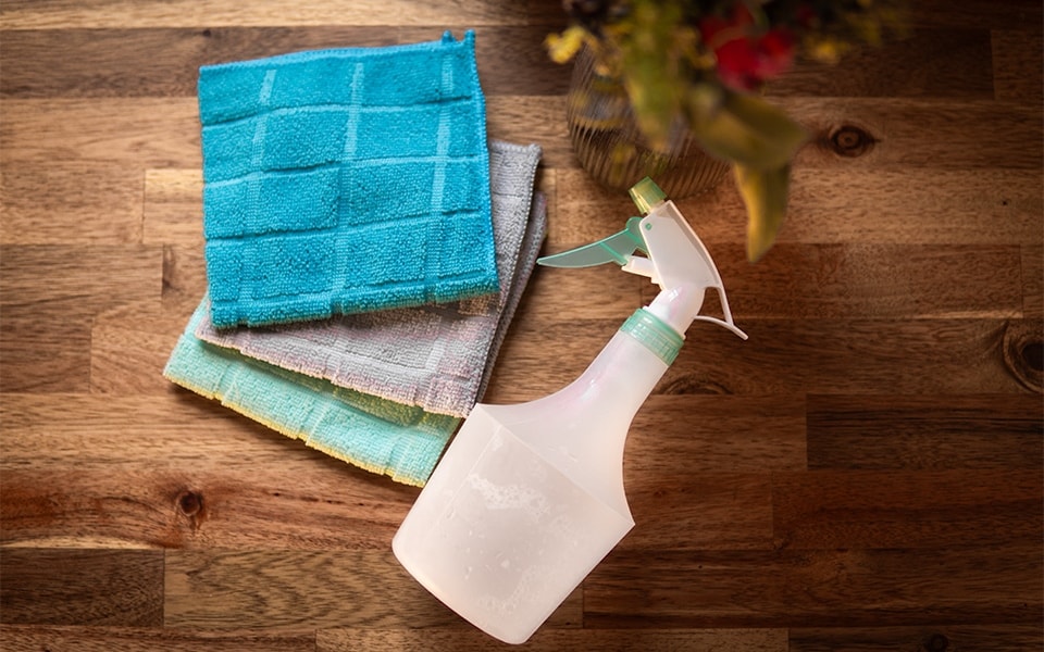water spray bottle and microfiber cloths