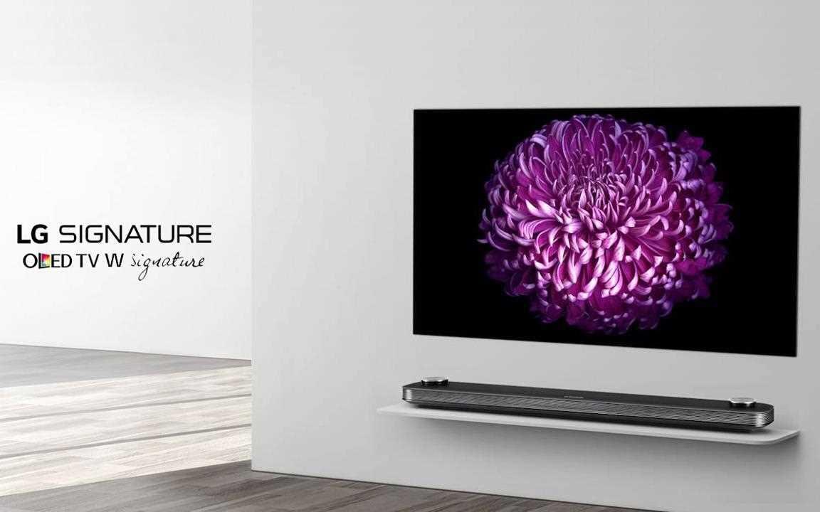 A image of lg signature wall paper tv in a living room