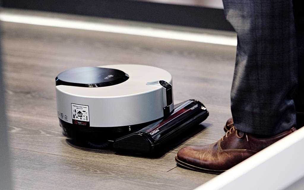 A photo of a lg robot vacuum cleaner performing at lg iot zone at berlin ifa 2017.