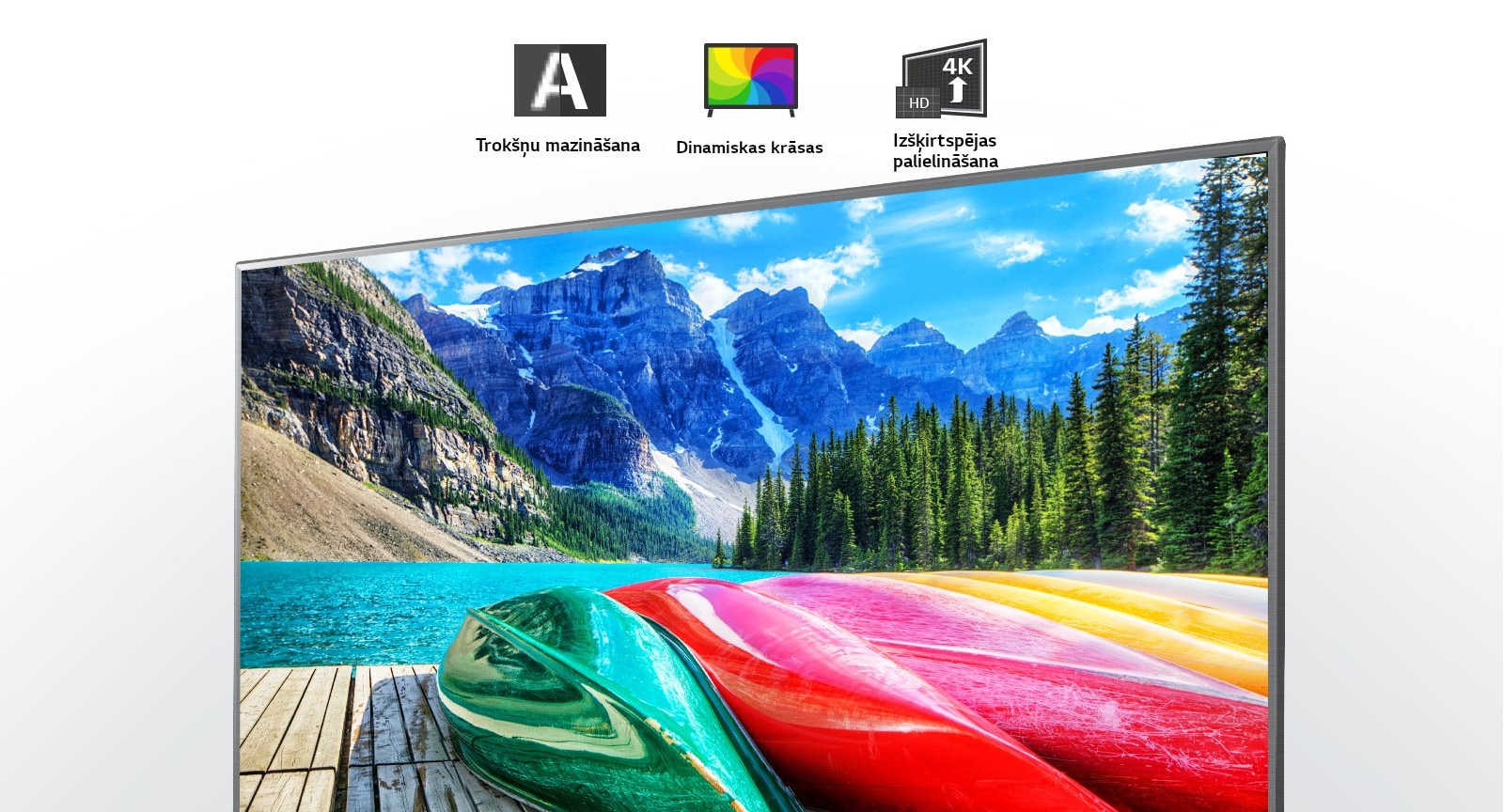 Trokšņu mazināšanas, dinamisku krāsu un izšķirtspējas palielināšanas ikonas un televizora ekrāns, kurā redzams gleznains skats ar kalniem, mežu un ezeru.