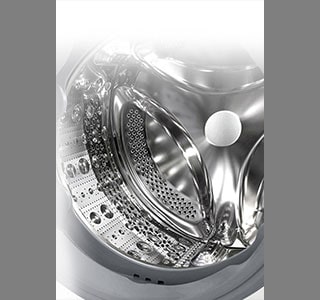 Attēls, kurā redzama veļas mazgājamās mašīnas iekšpuse ar nerūsējošām lāpstiņām.