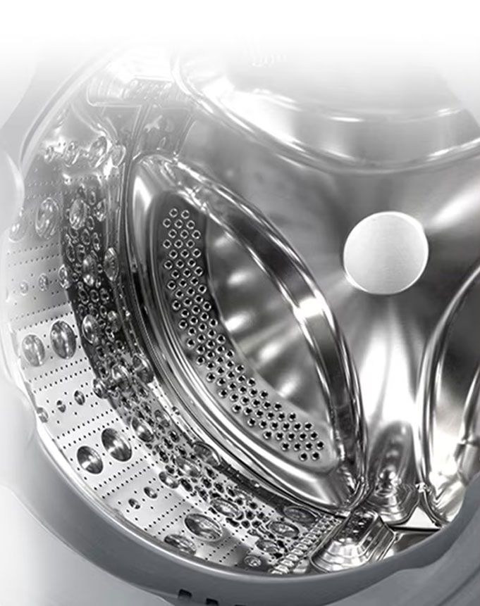 Attēls, kurā redzama veļas mazgājamās mašīnas iekšpuse ar nerūsējošām lāpstiņām.