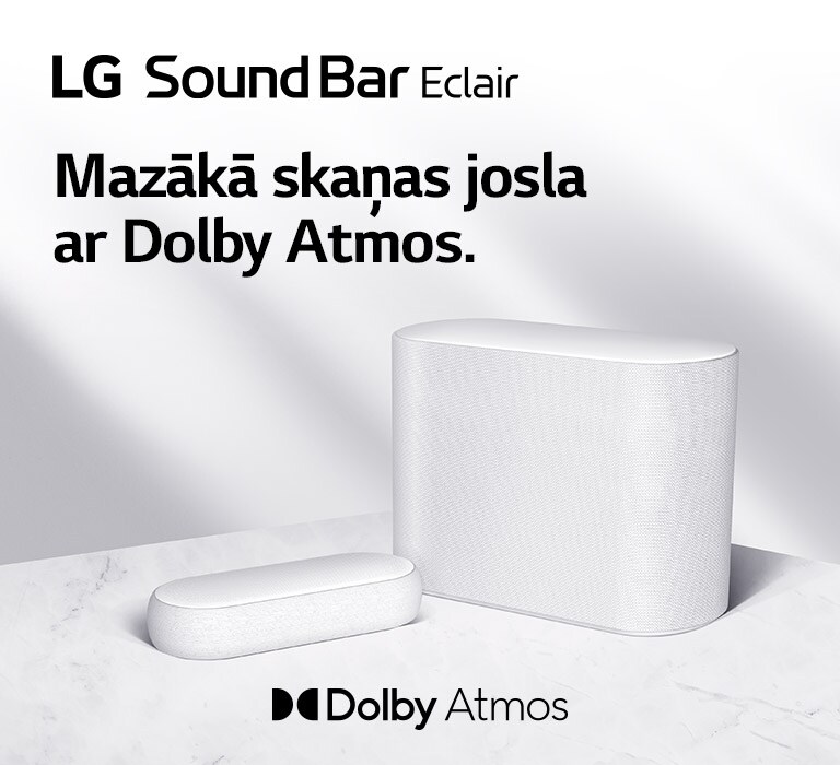 Uz marmora grīdas novietota skaņas josla un zemo frekvenču pastiprinātājs, kas ir pavērsti uz pretējām pusēm. Kreisajā augšējā stūrī redzams logotips “LG Sound Bar Éclair”, un teksts “Mazākā skaņas josla ar Dolby Atmos”. Zem skaņas joslas redzams logotips “Dolby Atmos”