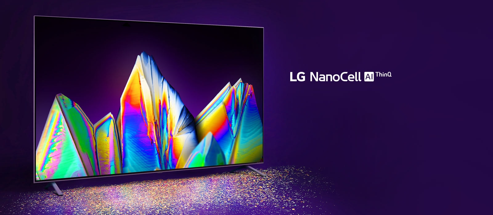 LG NanoCell AI ThinQ marķējums Attēlots NanoCell televizors ar kristālu ekrānā. Uz grīdas ir redzamas krāsu daļiņas.