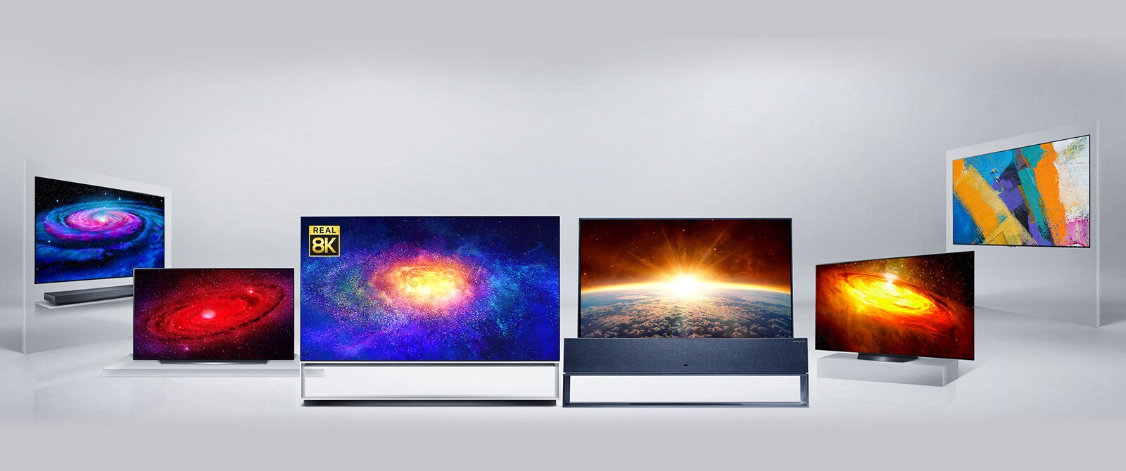 LG OLED modeļi RX, ZX, WX, GX, CX, BX izkārtoti telpā