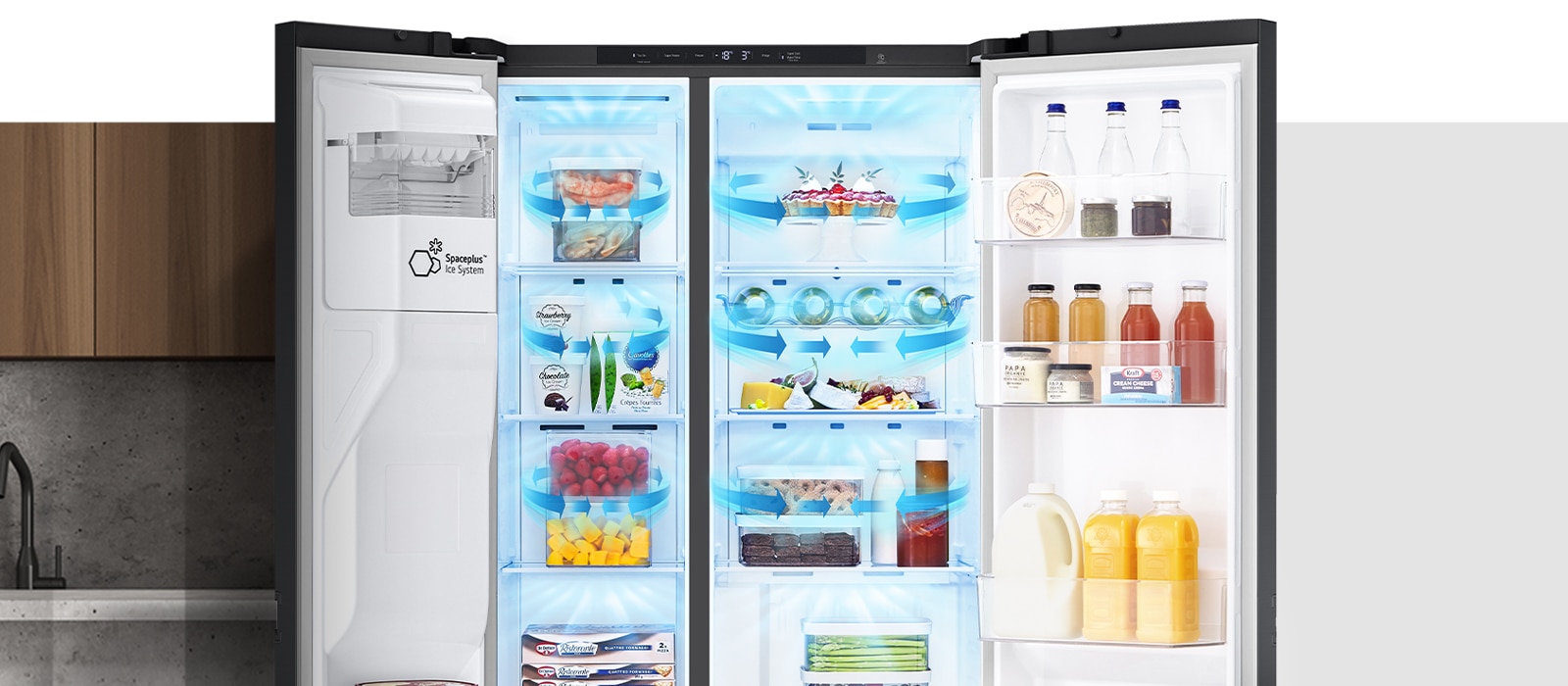 Ledusskapja iekšpusē, kas piepildīts ar sastāvdaļām, apakšā, abās pusēs un kopumā ir redzamas zilas bultiņas, kas nozīmē aukstumu.