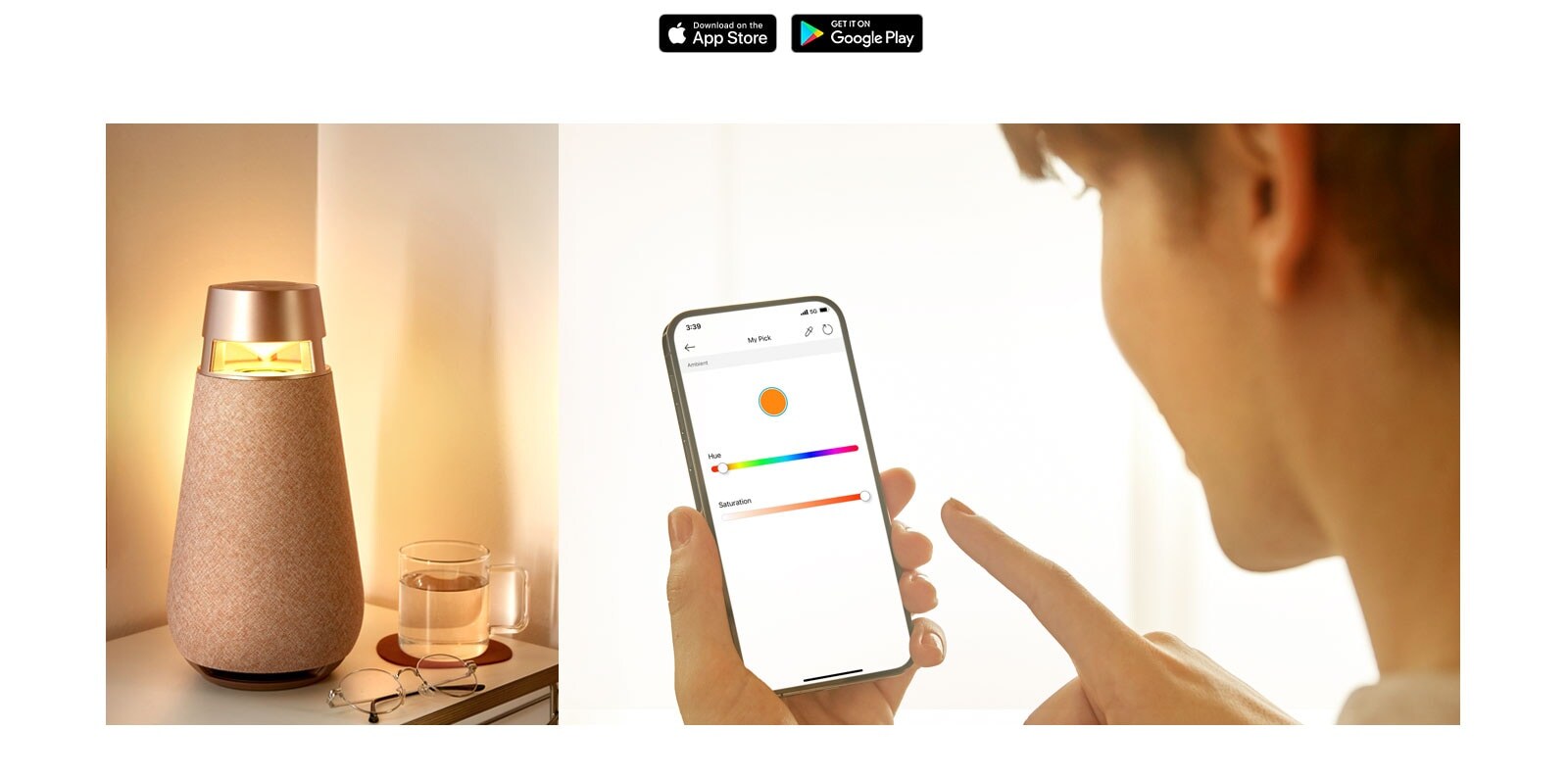 Vīrietis tur tālruni un izmanto XBOOM App.