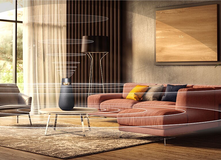 Attēls ar XBOOM 360 X03 skaņas viļņiem uz galda dzīvojamajā istabā.