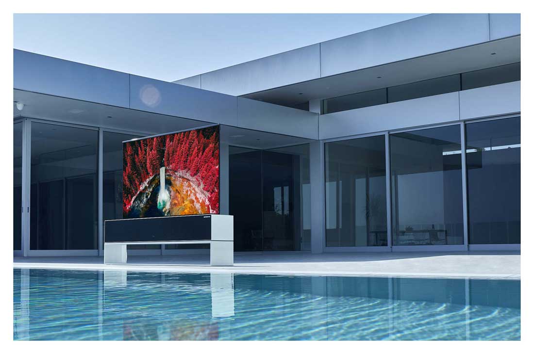 LG 65 collu OLED 4K televizors, Rollable TV, situated in front of the swimming pool of a luxurious house, showing a waterfall between maple trees, OLED65RX9LA, thumbnail 12