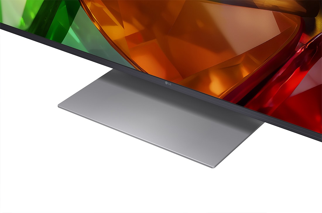 LG 86&nbsp;collu LG Mini RGB evo AI 4K viedtelevizors 2026, LG Mini RGB evo AI MRGB85 uzstādīts pie sienas plašā, mūsdienīgā dzīvojamā telpā, ekrānā attēlojot dzīvīgu abstraktu mākslas darbu ar virpuļojošiem, daudzkrāsainiem elementiem., 86MRGB87B3B, thumbnail 12